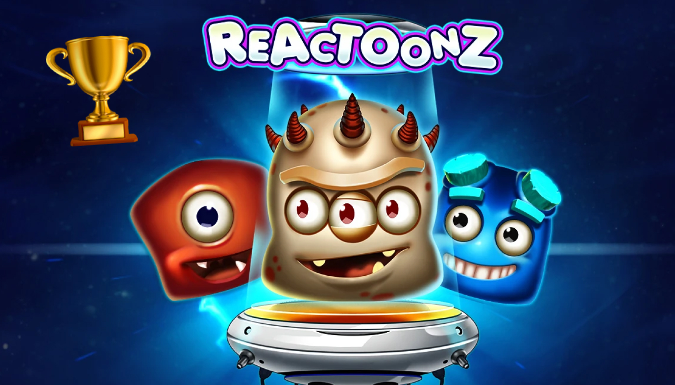 Reactoonz-pelin kuva, jossa näkyy värikkäät avaruusolennot futuristisessa ympäristössä.
